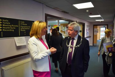 Jacquie Winning speaking with Provost Robbins