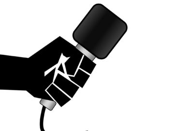 Microphone in hand for news podcast