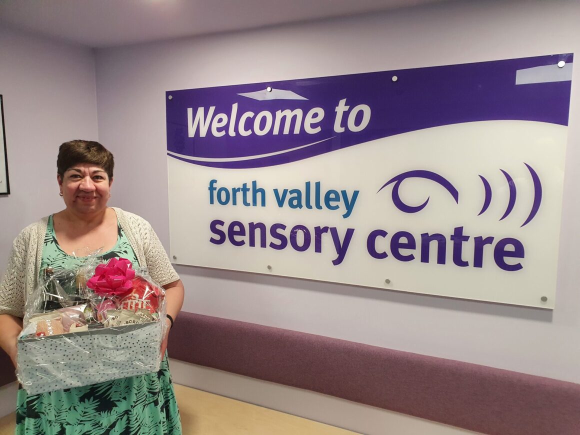 Raffle winner Lesley with her prize
