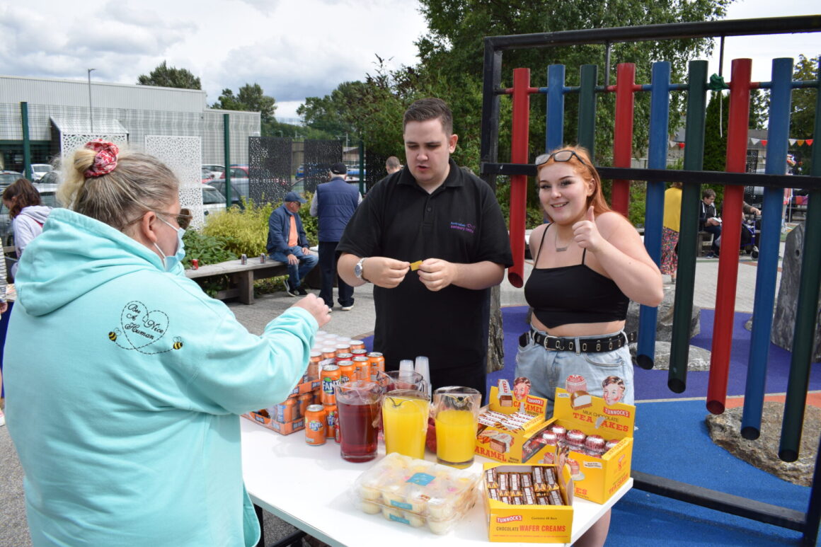 Tom and Tira serve juice and Tunnock's!