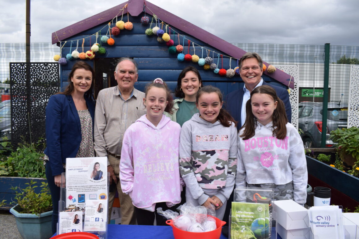 Kim, Pat Reid, Sara and Stephen Kerr with three members of the youth group