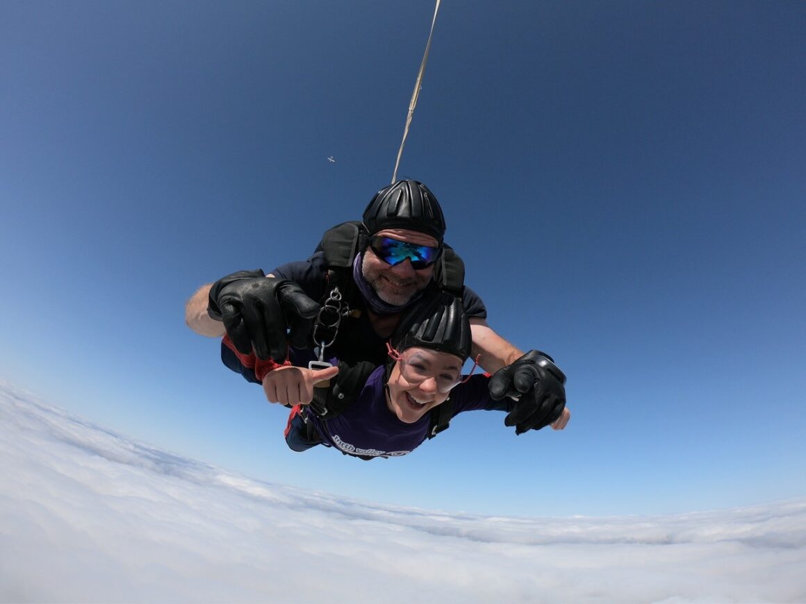 Instructor holds Amy's hands