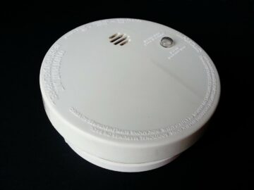 smoke alarm on black background