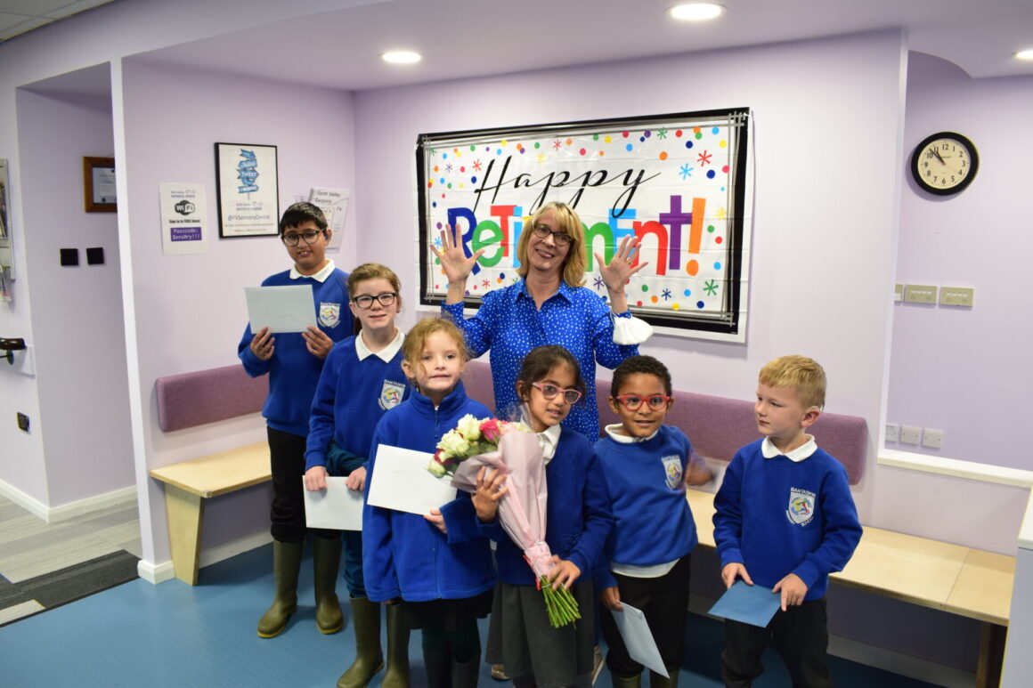 Windsor Park pupils hand over cards and flowers