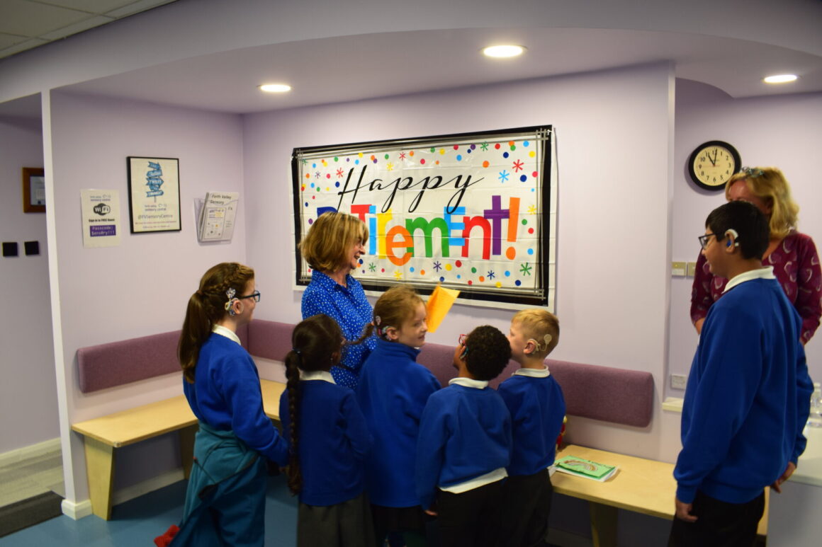 Caroline and Windsor Park pupils with cards