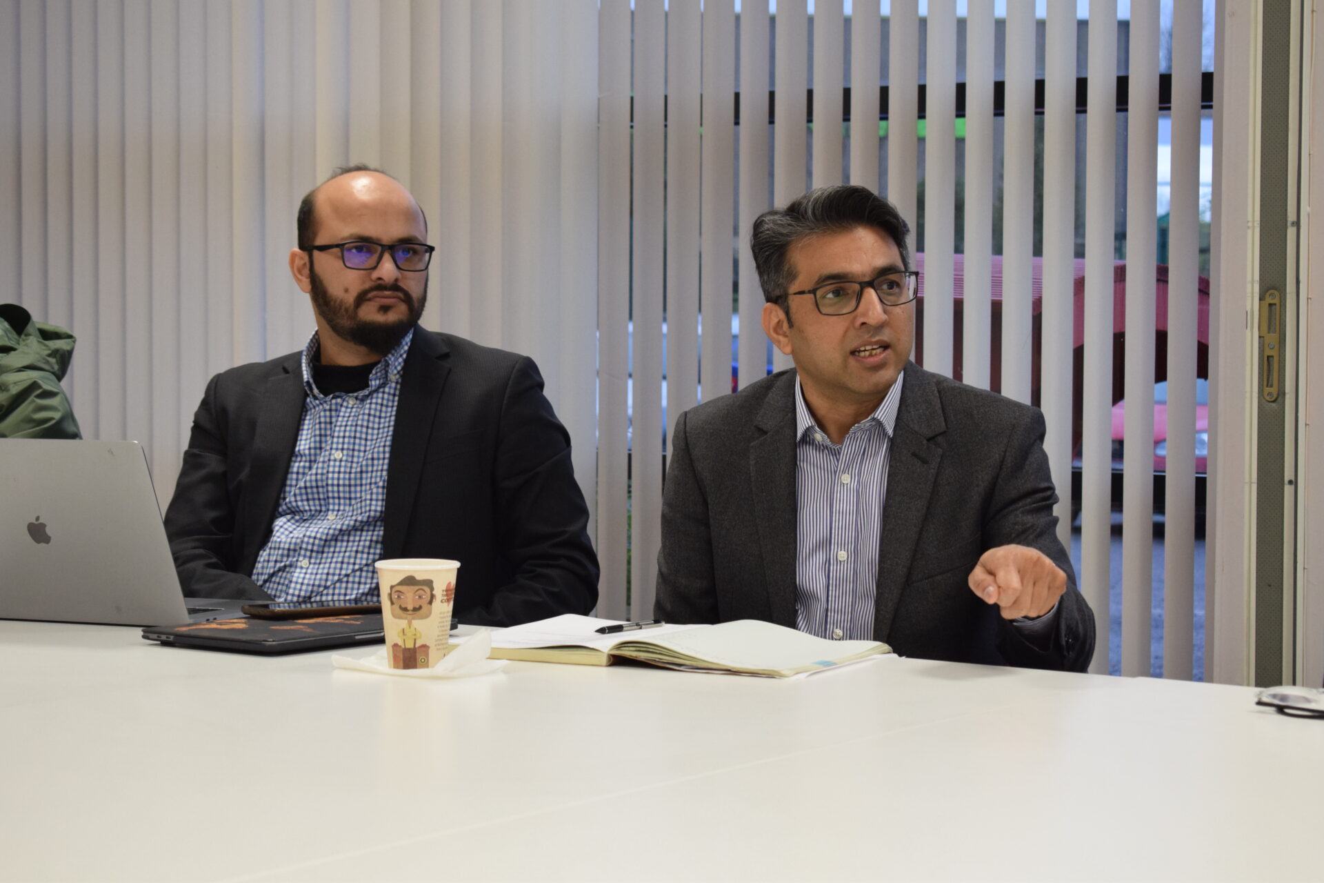 Dr Abbasi and Dr Ahmad addressing the group