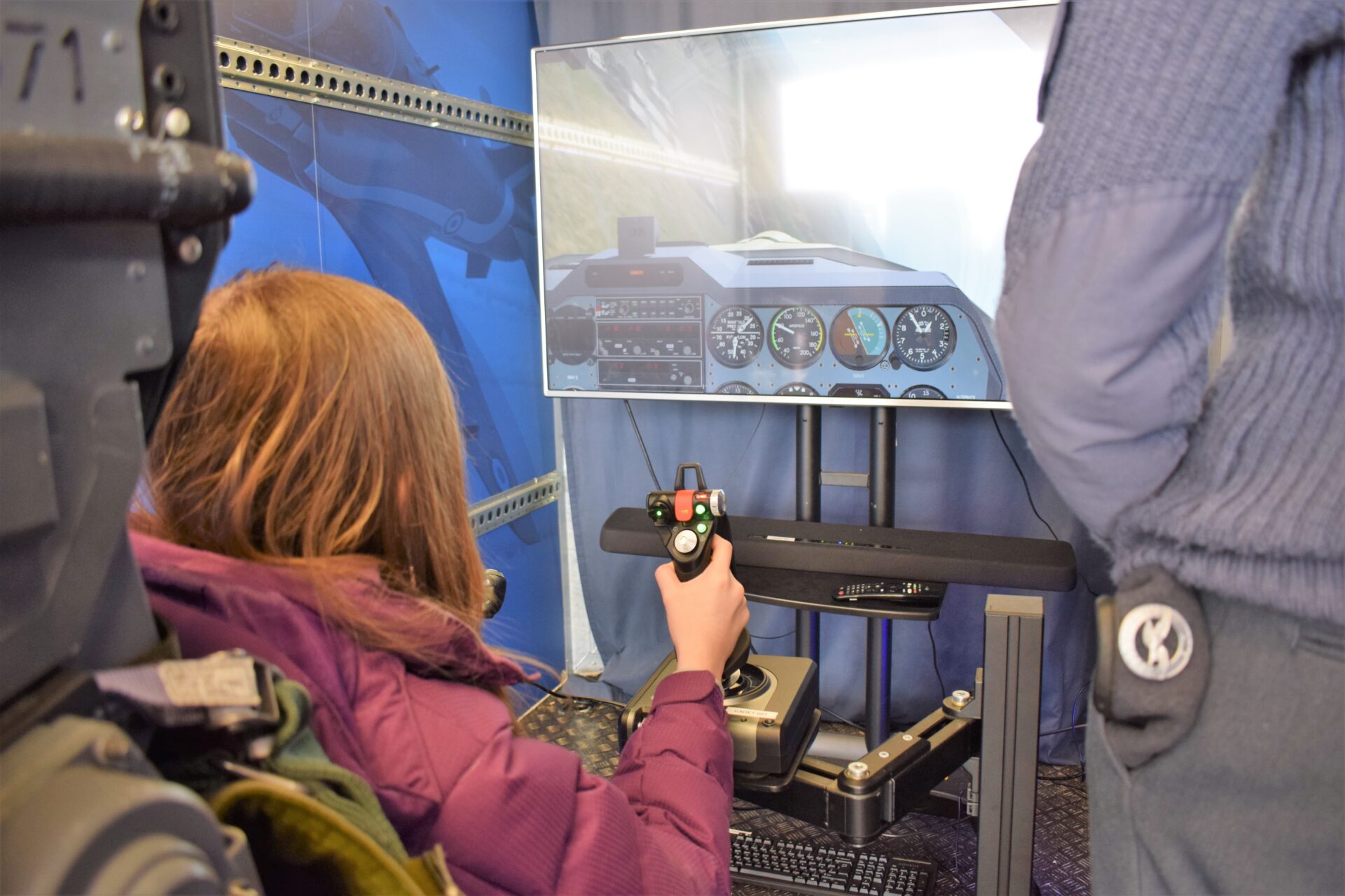 Josie at the simulator controls