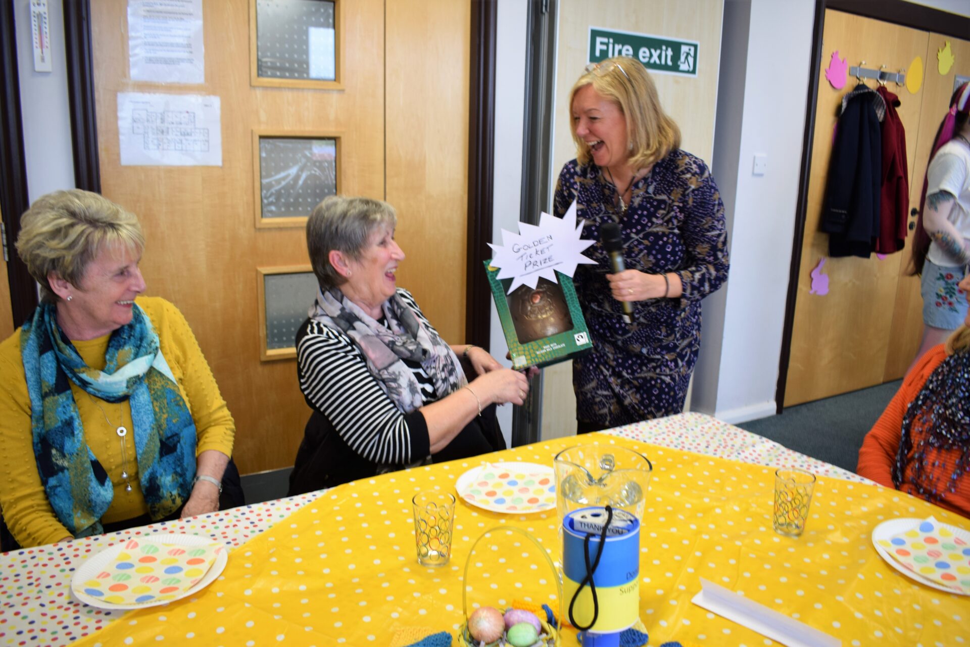 Our golden ticket easter egg winner receives their prize from Jacquie