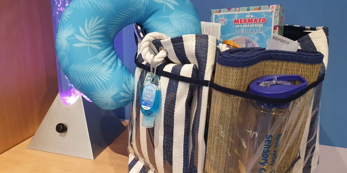 Prize bag with neck rest, water bottle and lots of other goodies inside!