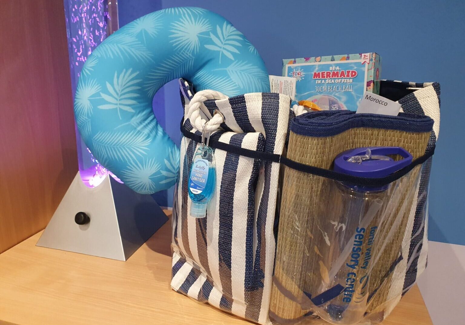 Prize bag with neck rest, water bottle and lots of other goodies inside!