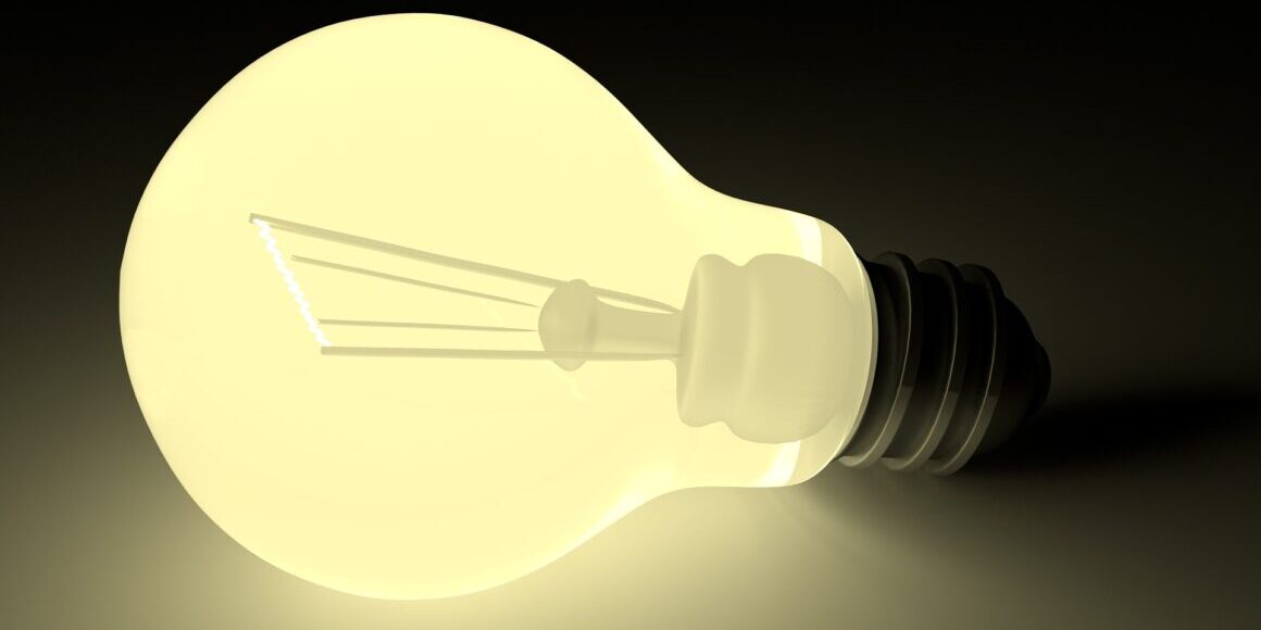 A cartoon lightbulb emitting a warm yellow glow